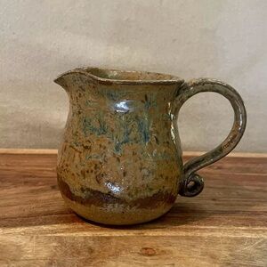 Vintage Handmade Pottery Creamer In Brown Tan Blue Green Detailed Handel 3.5”